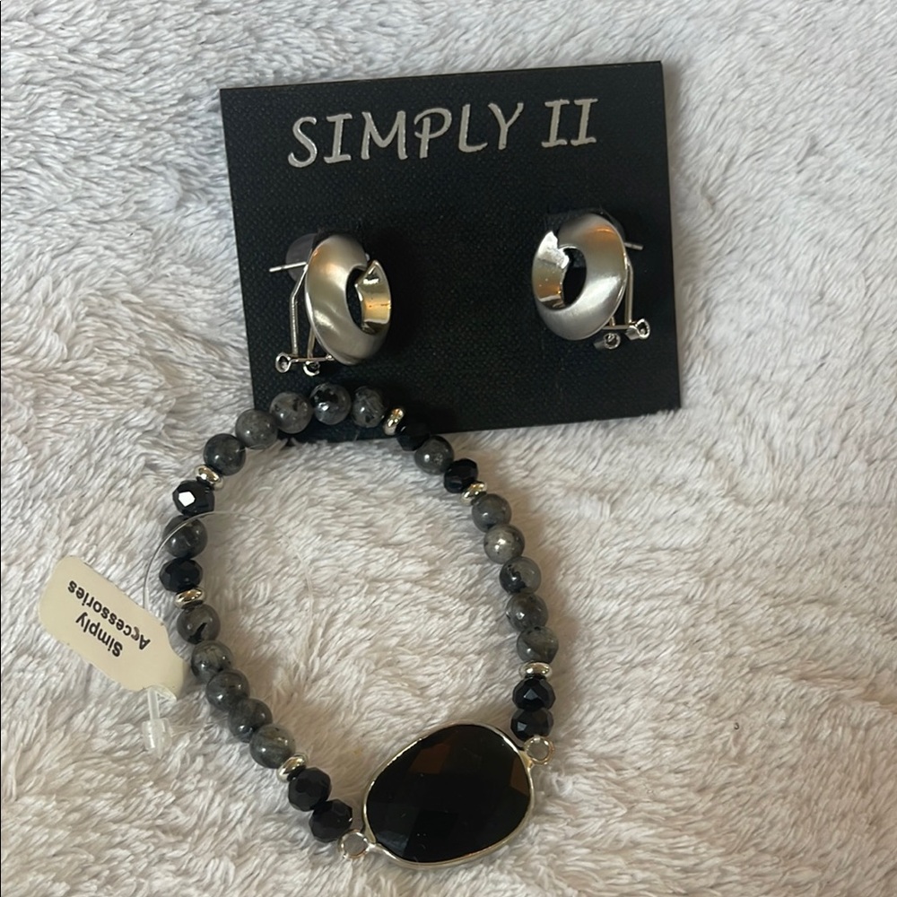 NWT boutique bracelet, and earrings set Silvertone stone, black crystals